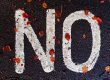 'no' painted on a street